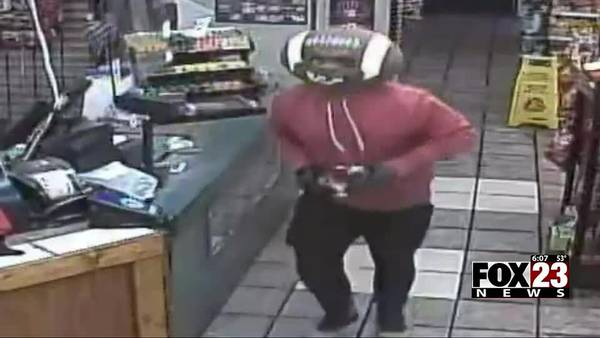 Video: Ponca City robber covers face with bizarre football hat