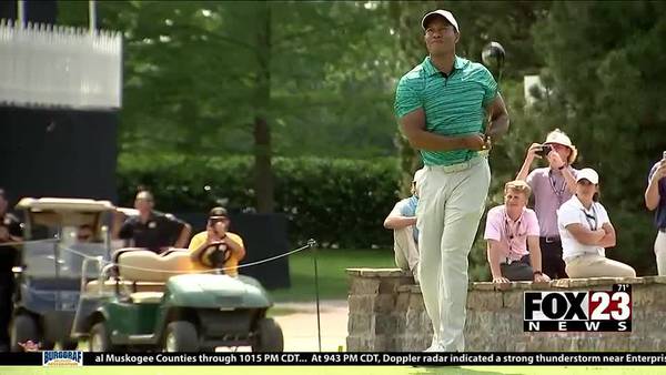 Local fans take in a Tiger Woods practice round at Southern Hills