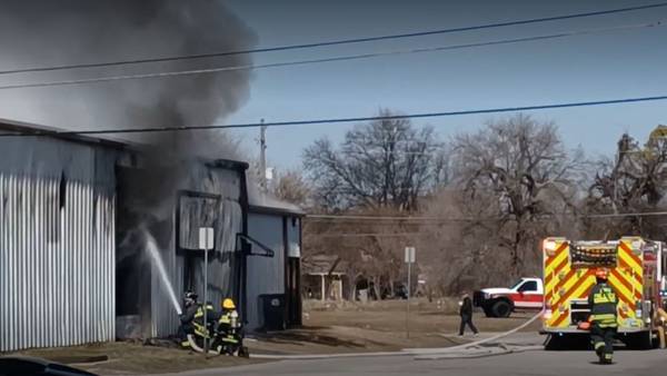 Investigation launched after building catches fire in Jenks