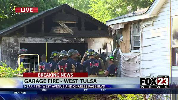 Video: Firefighters put out garage fire in west Tulsa