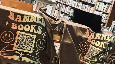 Norman bookstore owner puts QR code on T-shirts