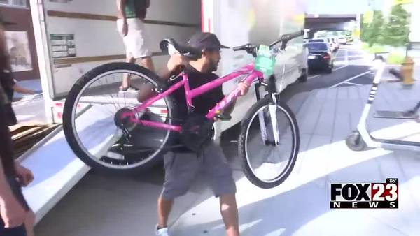 Black Wall Street 100 donated more than 100 bikes to Tulsa children