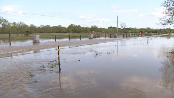 Okmulgee County road flooding trapped two people Tuesday