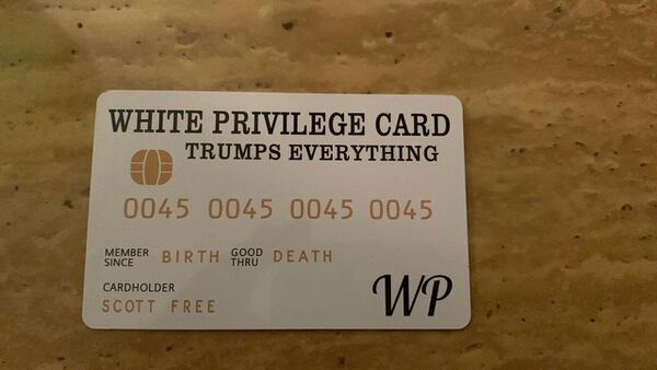 Protests over “white privilege cards” being handed out at a Sand Springs high school by a student